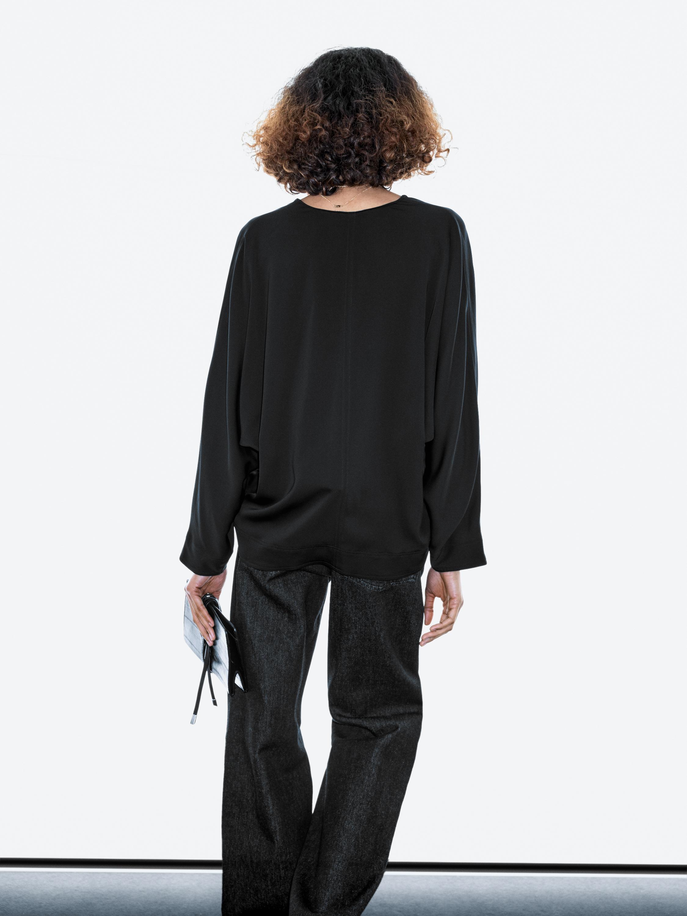 Flowing blouse with V-neckline